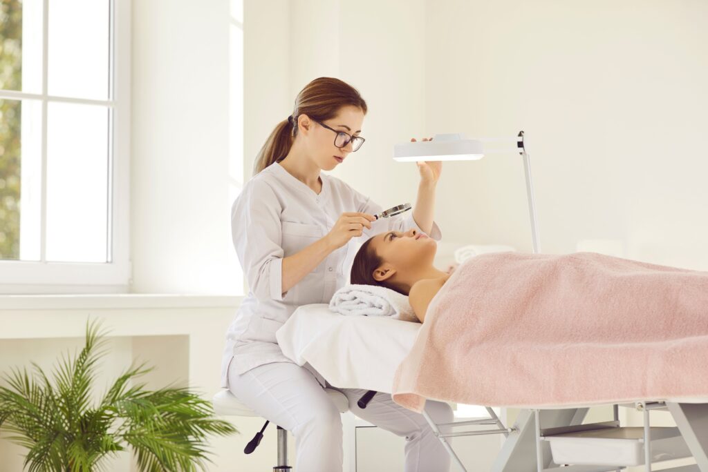 Someone looking into skin at a clinic